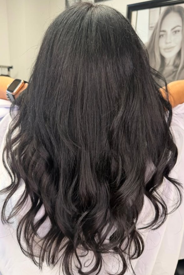 Glossy dark brunette voluminous hair by Root 6 Hair Salon